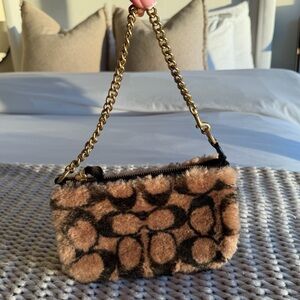 Coach × Jennifer Lopez Tan and Black Shearling
Shoulder Bag